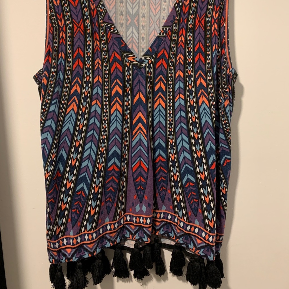 Tart brand, sleeveless, jersey top with fringe
